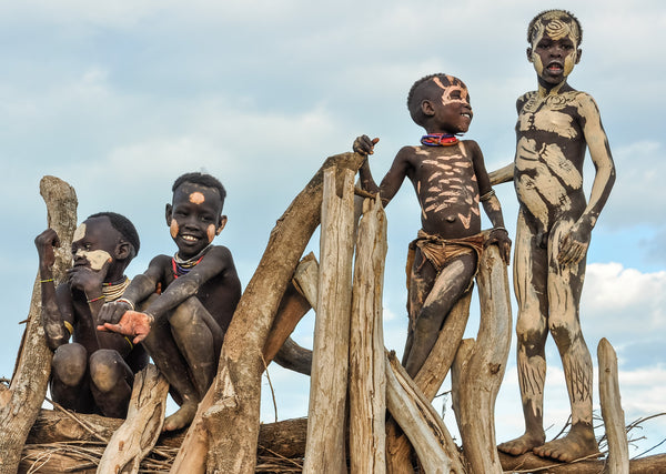 Boys on a Fence - Omo Valley - Kara Tribe