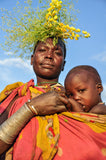 Mother with Yellow Flowers - Omo Valley - Surma Tribe