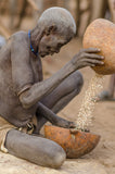 Old Lady Sifting Corn - Omo Valley - Kara Tribe